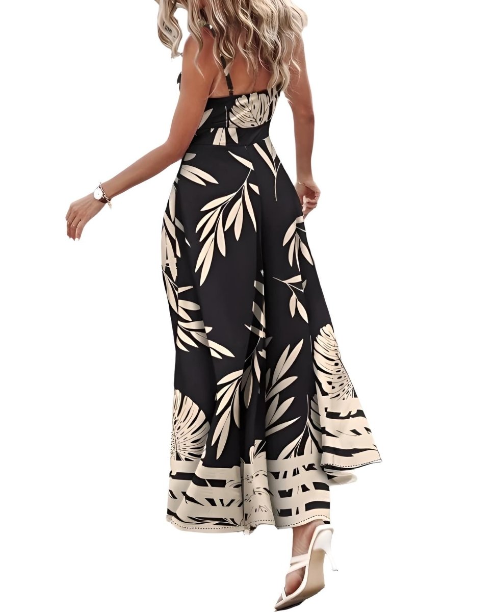 The image is showcasing a Summer Sleeveless Spaghetti Strap Cami Maxi Dress for Women Leaf Print Knotted High Low Front Split Summer Long Dress at Mommy & Lino's Closet