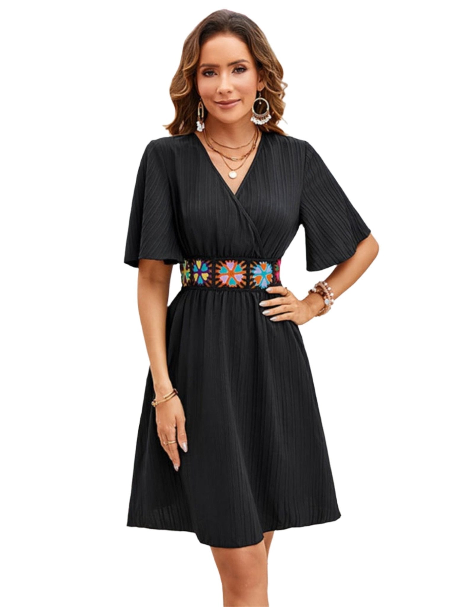 The image is showcasing a Surplice Flutter Sleeve Mini Dress for Women Casual Summer Dress at Mommy & Lino's Closet