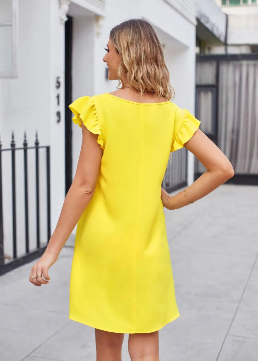 The image is showcasing a Women's Solid V Neck Summer Mini Dress Ruffle Trim Cap Sleeve Summer Tunic Dress A - Line Short Summer dress at Mommy & Lino's Closet